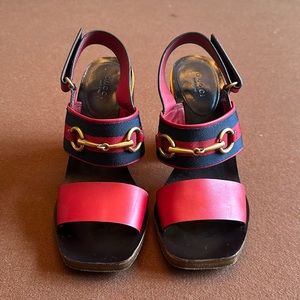 Gucci horse bit strappy sandal with gold heel